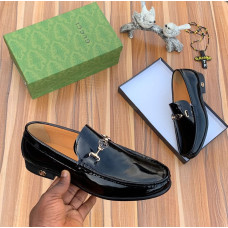 Black Patent Leather Gucci loafer with a