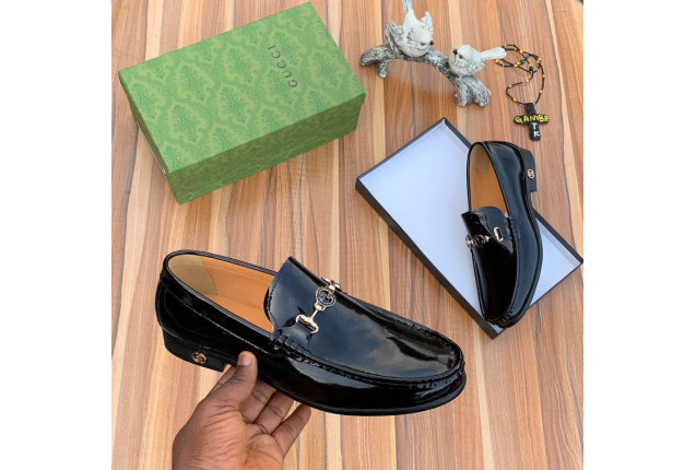 Black Patent Leather Gucci loafer with a Horsebit detail