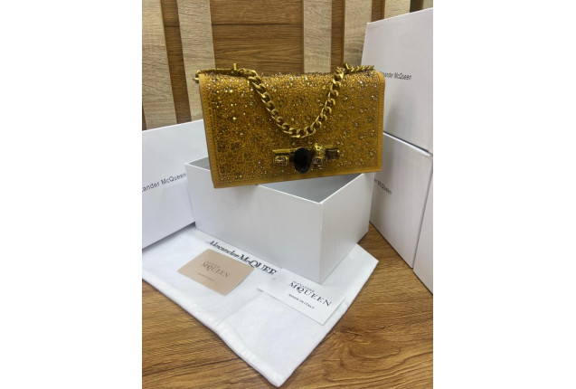 Glittery Champagne-colored clutch-gold