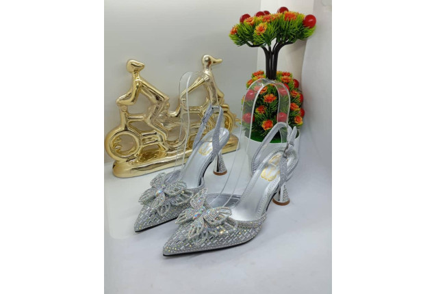 Silver high-heeled shoes x  1