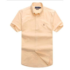 light peach-colored short-sleeve button-up shirt