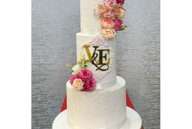 Floral white wedding cake