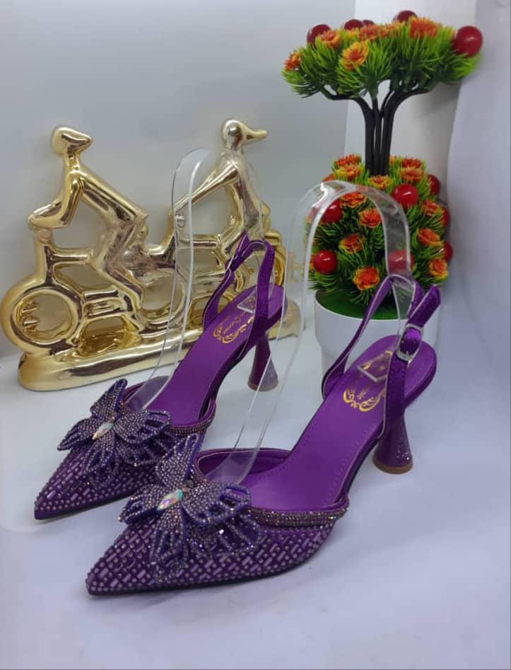 purple high-heeled shoes